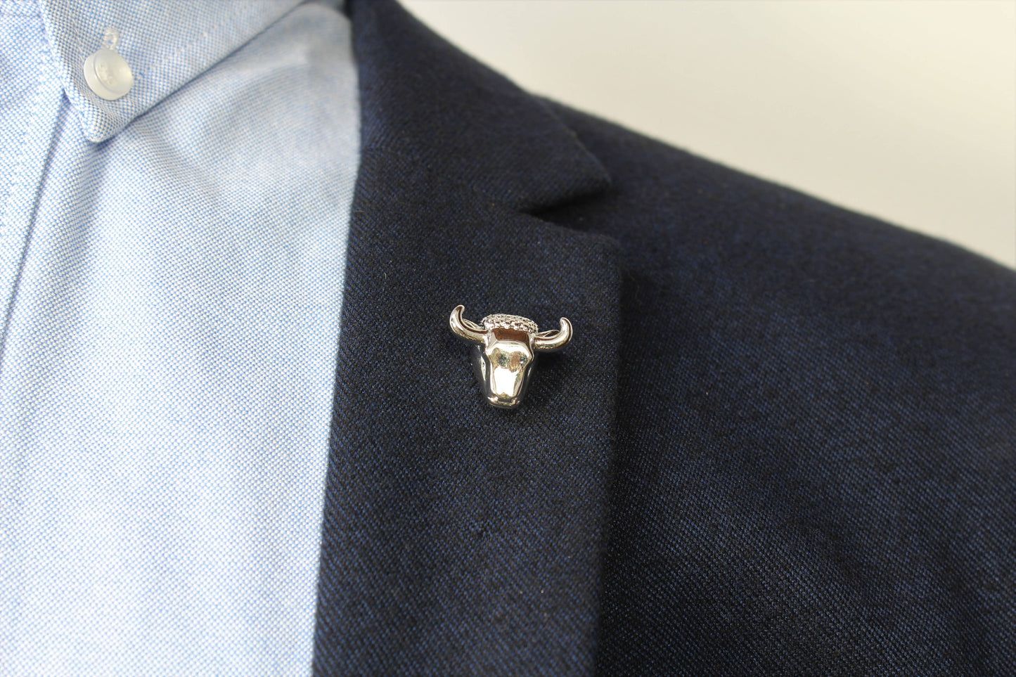 Stolen Riches Lapel Pin