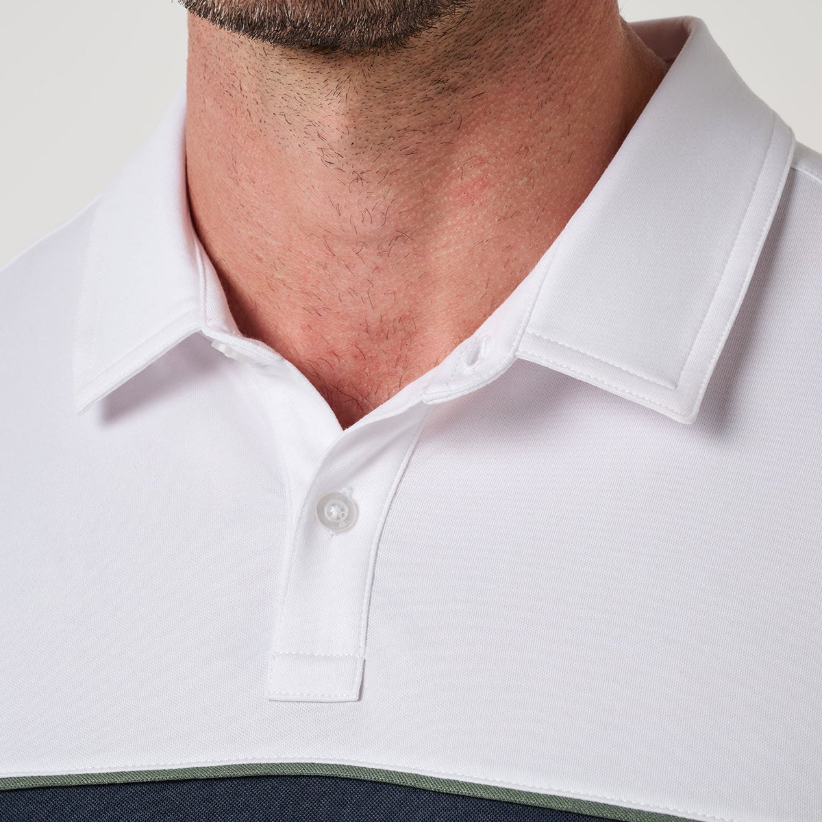 TravisMathew White Featherweight Colorblock Polo